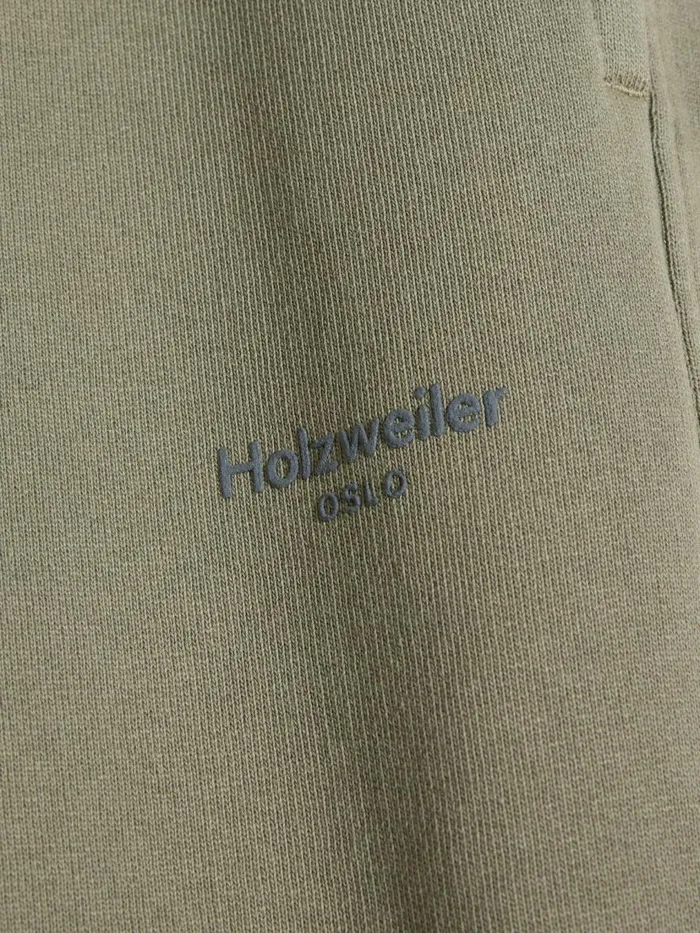 Trousers and Shorts Men Holzweiler M Lagoon Oslo Trousers Dk Green